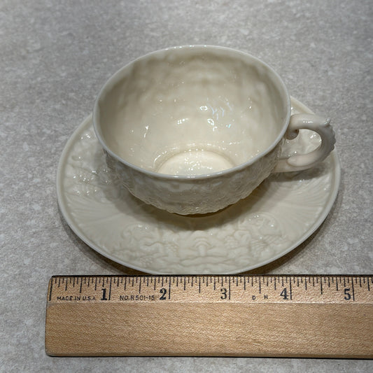 Belleek "Mask" Cup and Saucer