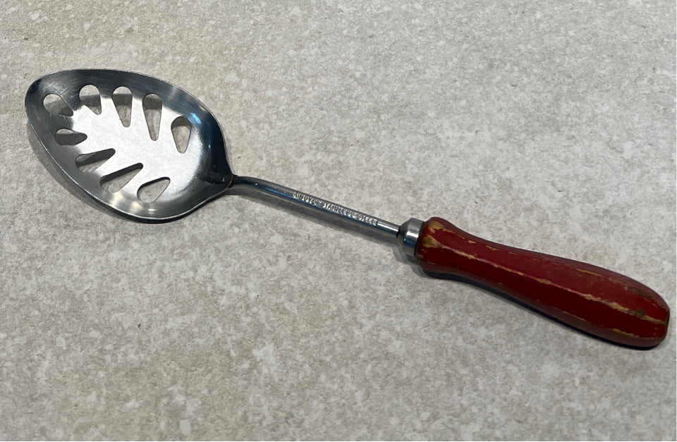 Red Handled Decorative Utensil