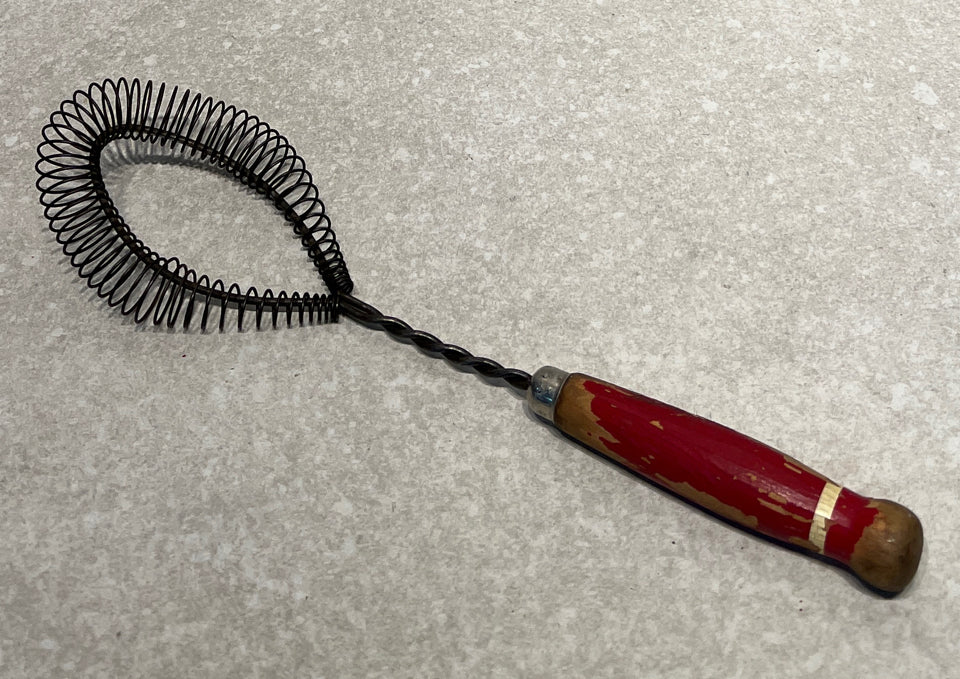 Red Handled Decorative Utensil