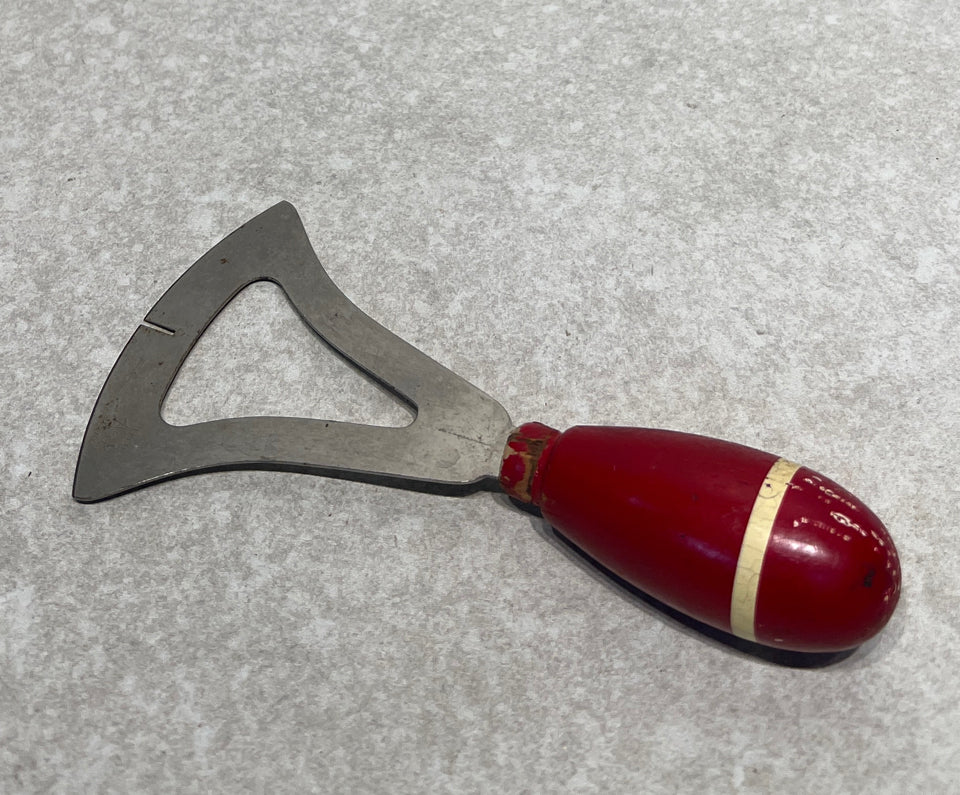 Red Handled Decorative Utensil