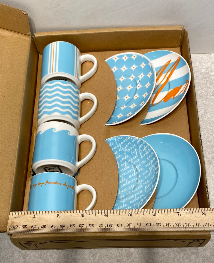 Set of 4 Cups and Saucers