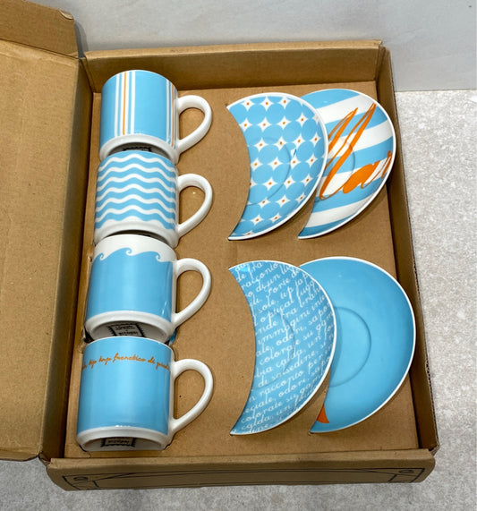 Set of 4 Cups and Saucers