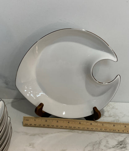 Set of 7 Royal Doulton Plates