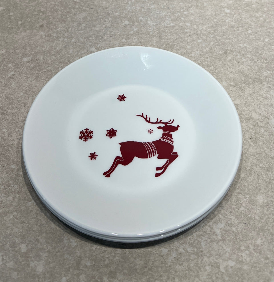 Set of 4 Rudolph Corelle Plates