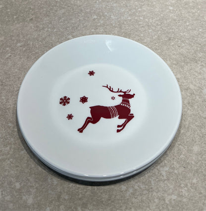 Set of 4 Rudolph Corelle Plates