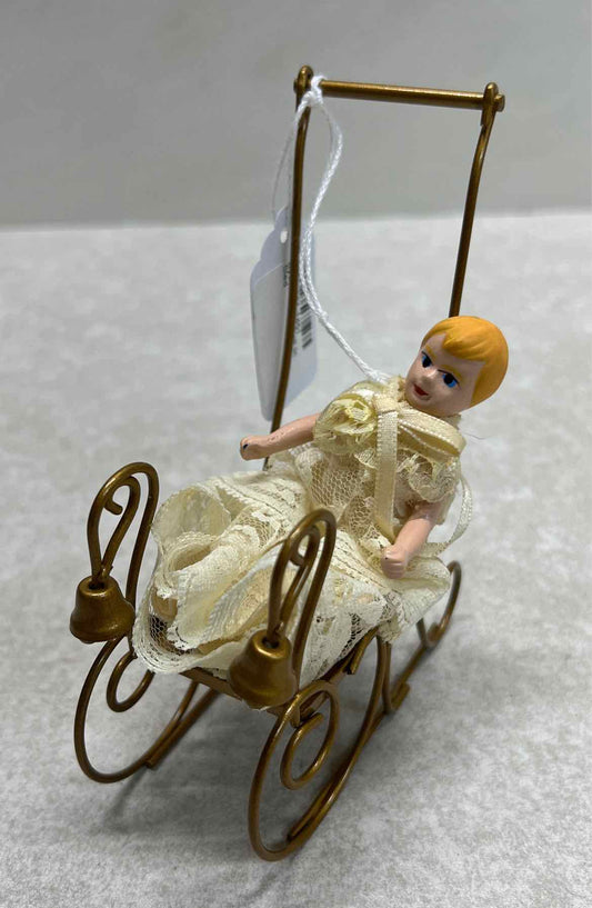 Byers' Choice Doll in Sled