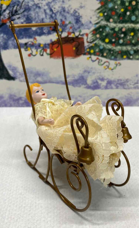 Byers Choice Doll In Sled