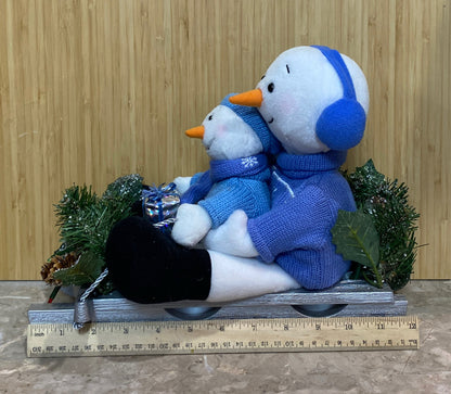 Snowman On Sled