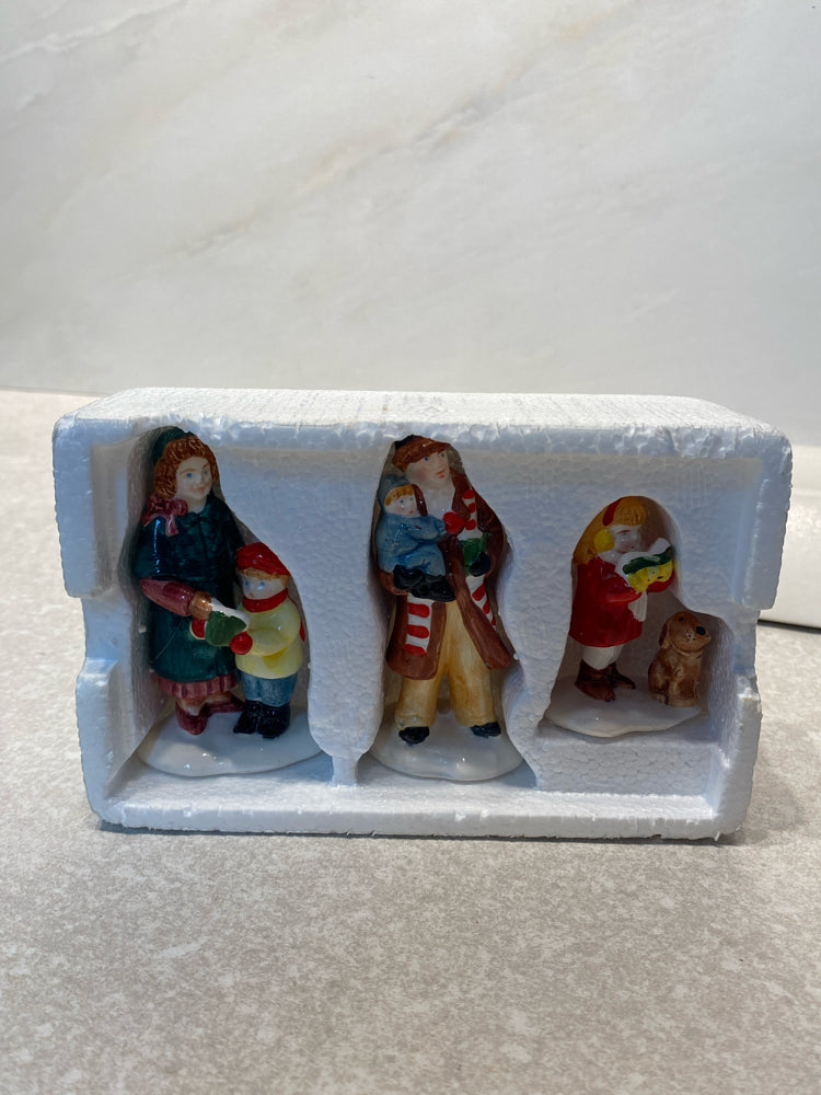 Dept. 56 Caroling Family