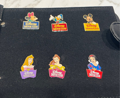 Disney book with 9 Pins