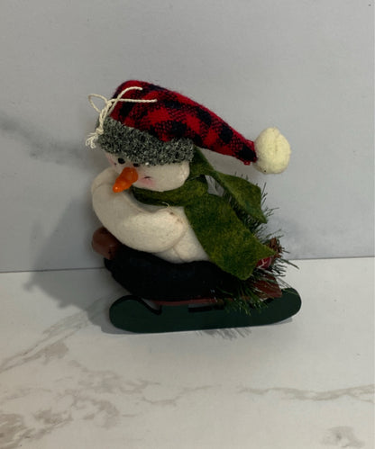 Snowman On Sled