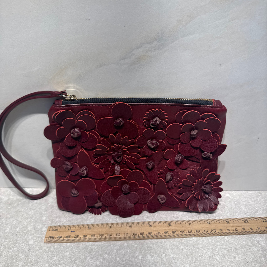 Punto Fibbia Leather Flower Wristlet