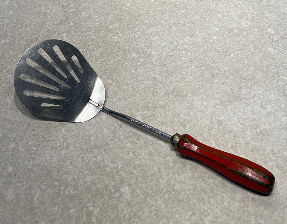 Red Handled Decorative Utensil