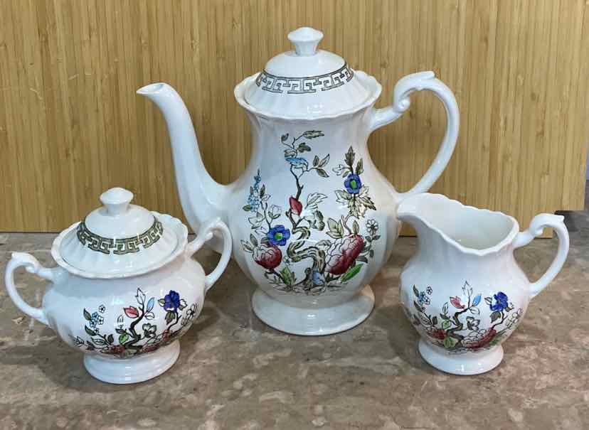 Teapot, Sugar, Creamer, & 8 Plates