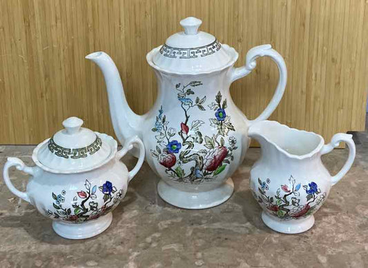 Teapot, Sugar, Creamer, & 8 Plates