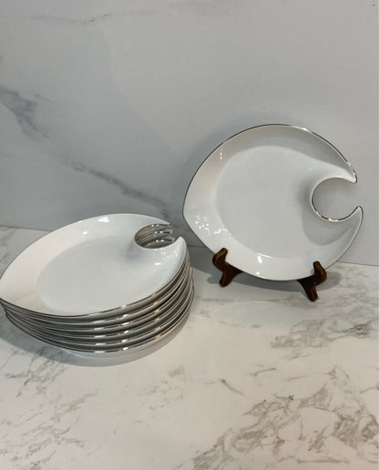 Set of 7 Royal Doulton Plates