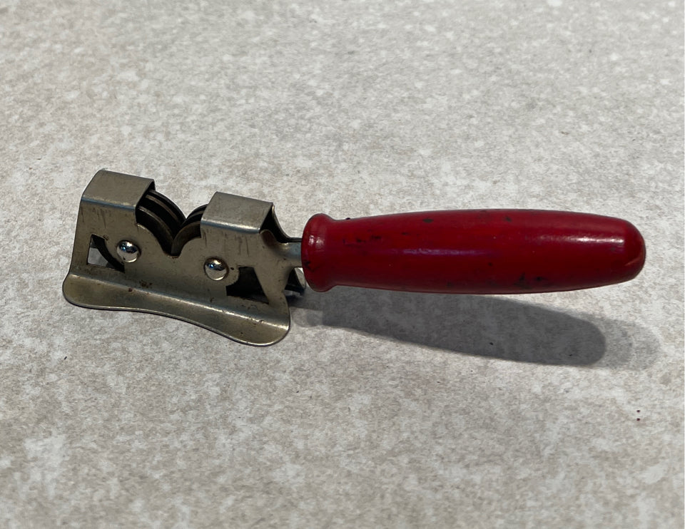 Red Handled Decorative Utensil