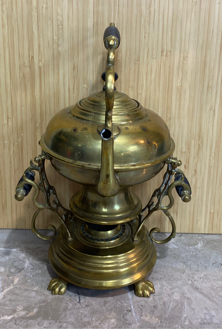Brass Tipping Teapot