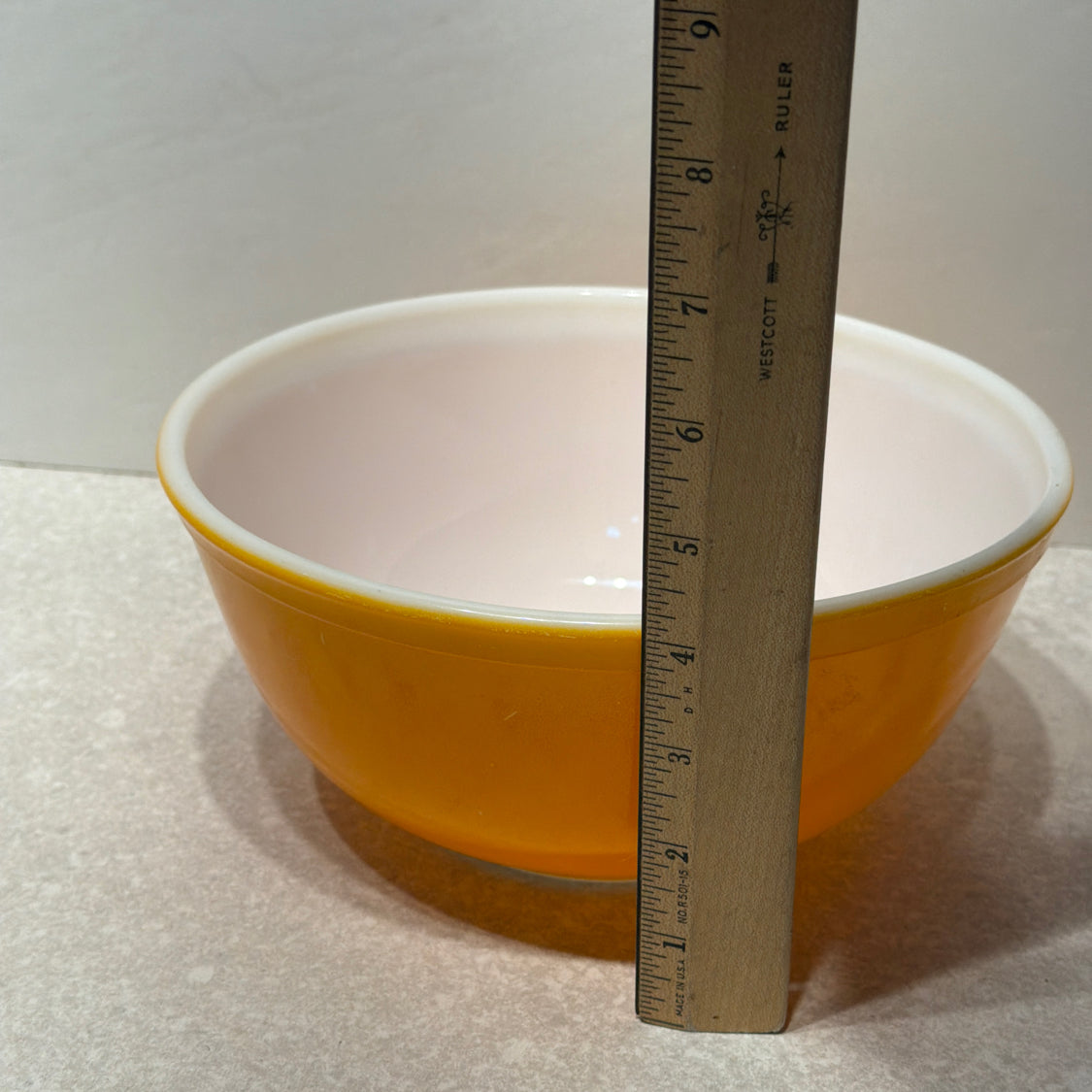 Orange Pyrex bowl