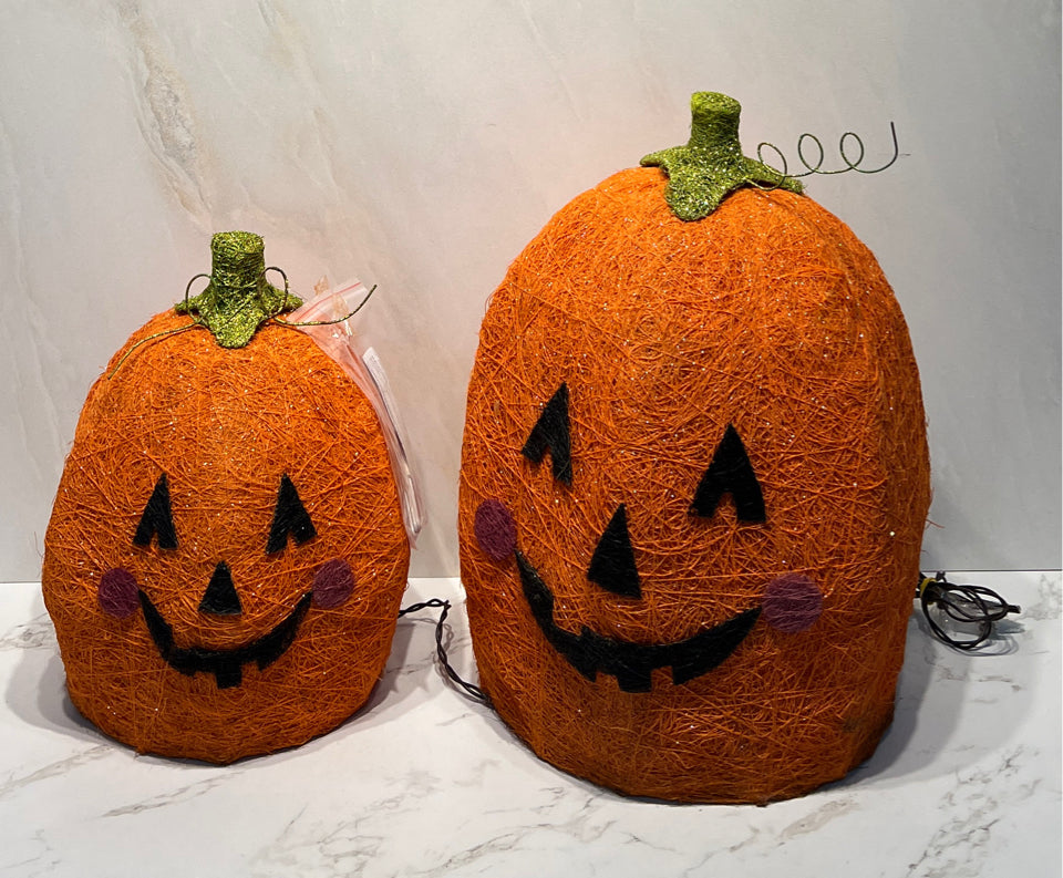 Pair of Lighted Pumpkins