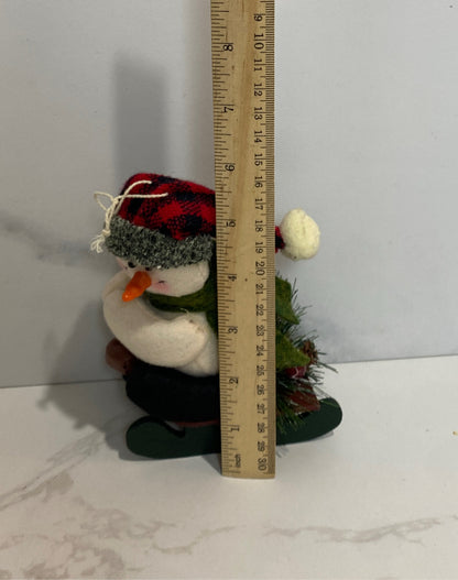 Snowman On Sled