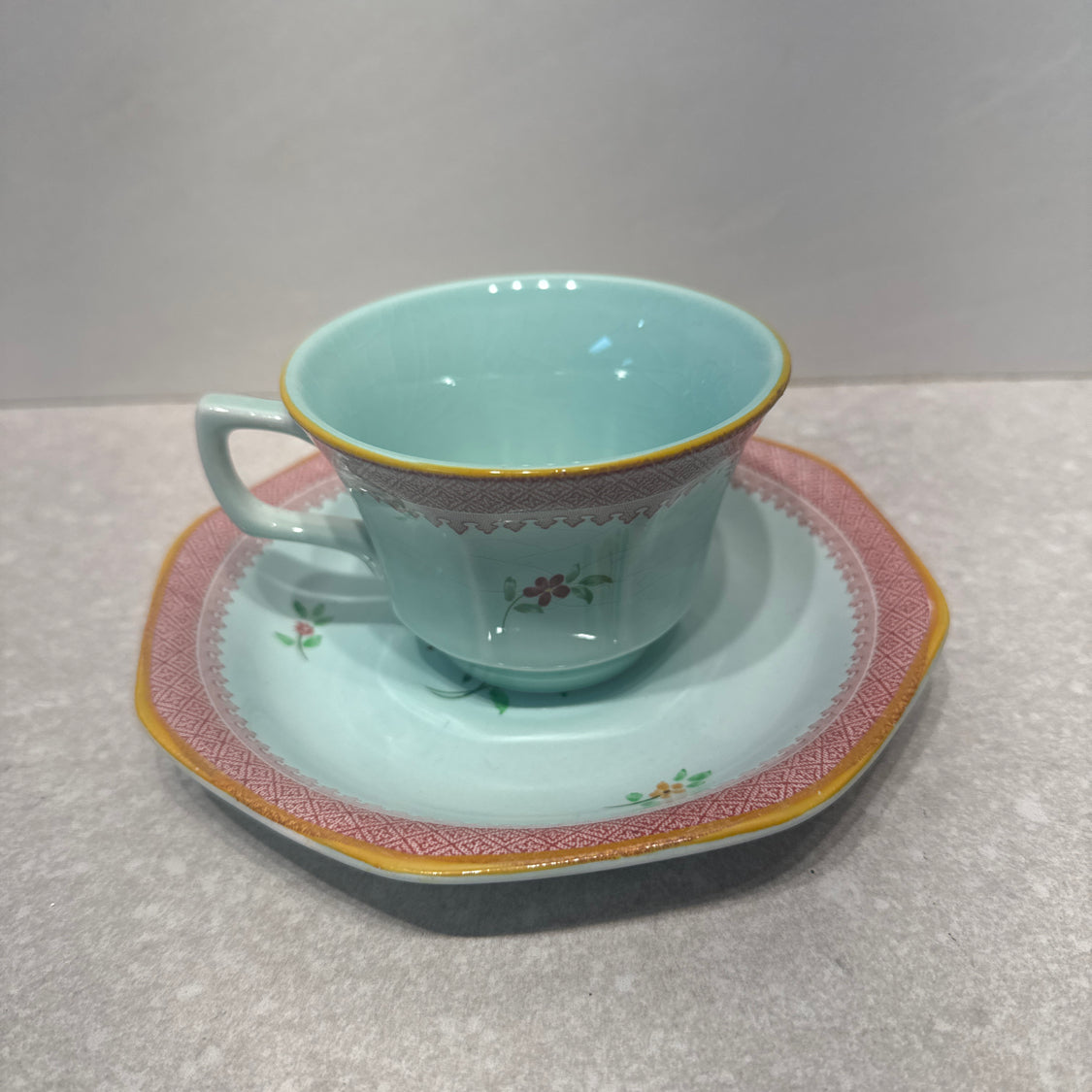 Cup And Saucer Calyx Ware