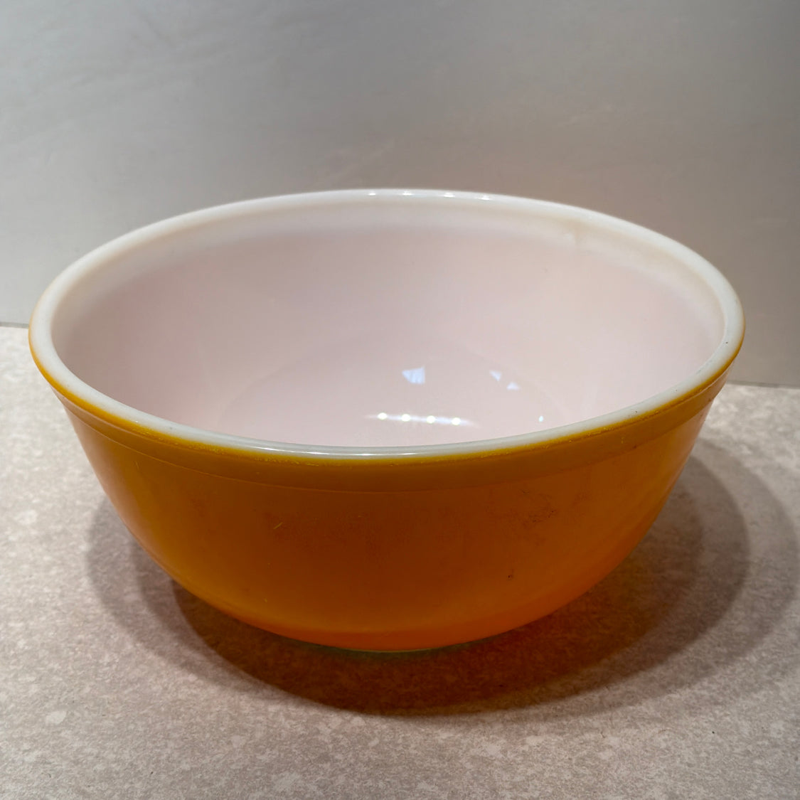 Orange Pyrex bowl