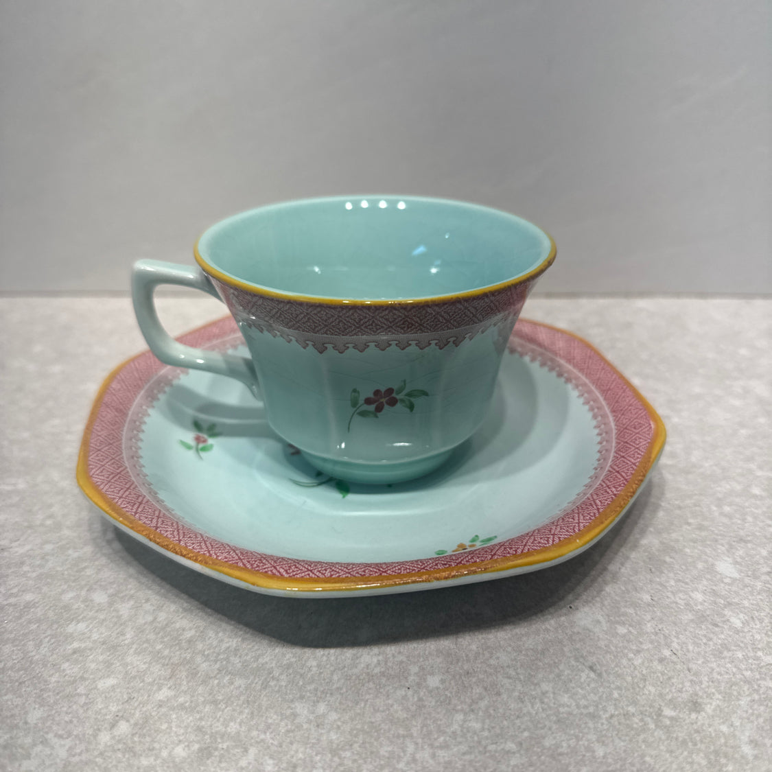 Cup And Saucer Calyx Ware