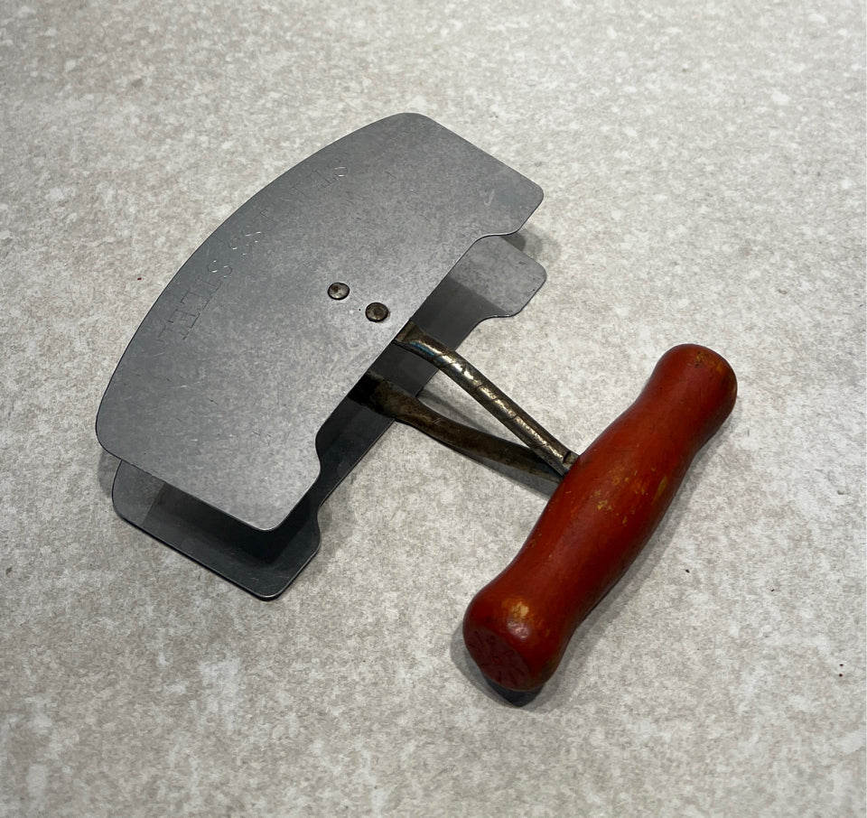 Red Handled Decorative Utensil