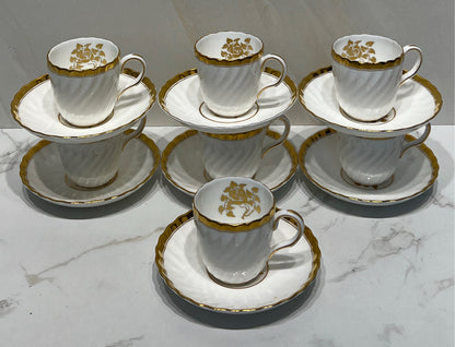 Set of 7 Minton Cups and Saucers