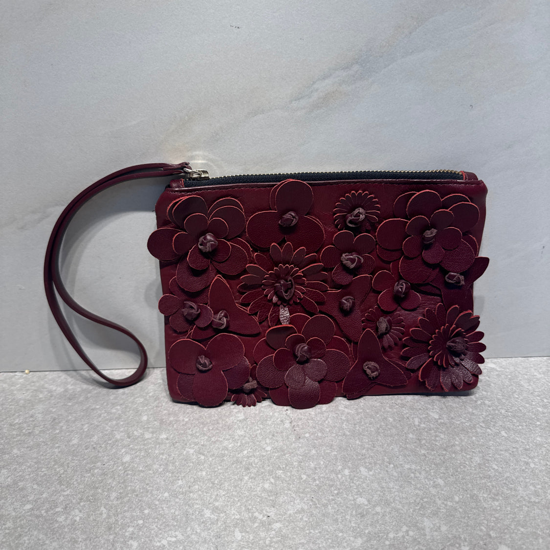 Punto Fibbia Leather Flower Wristlet
